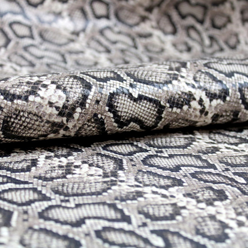 Embossed snakes livery leather